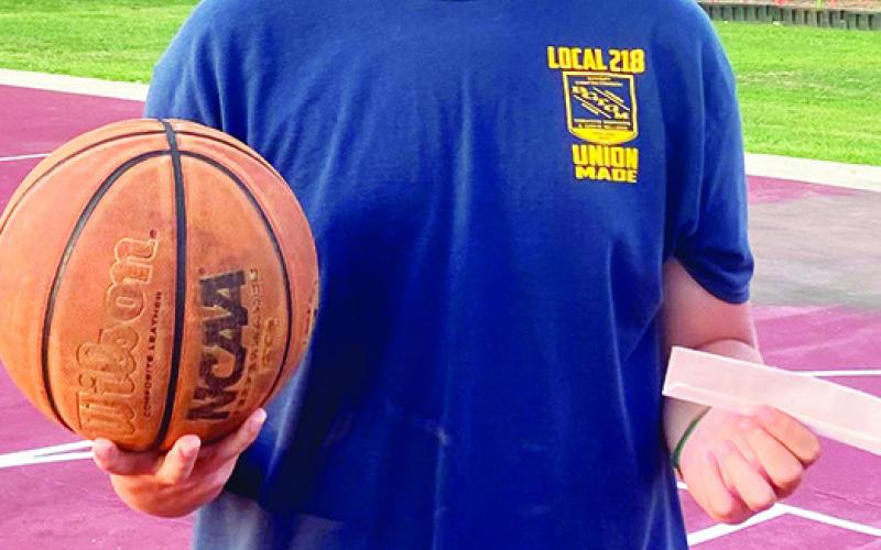 Huck Hallam won the high school division of the Freedom Fest free throw contest, July 8, at the Columbus City Park. Courtesy Photo.