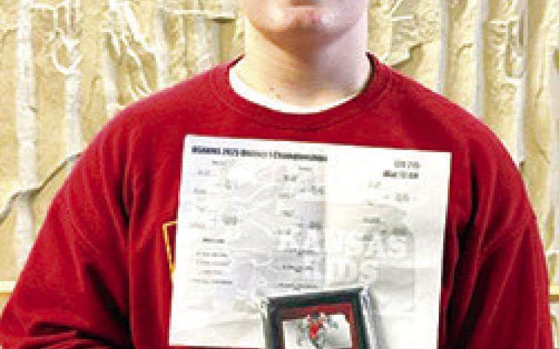 Titan Wrestler Briggs Johnson won the USAWKS 2025 District 1 Championship in the 10U 90 class, Saturday in Lansing. He will be wrestling in the state tournament this weekend in Topeka. Courtesy photo.