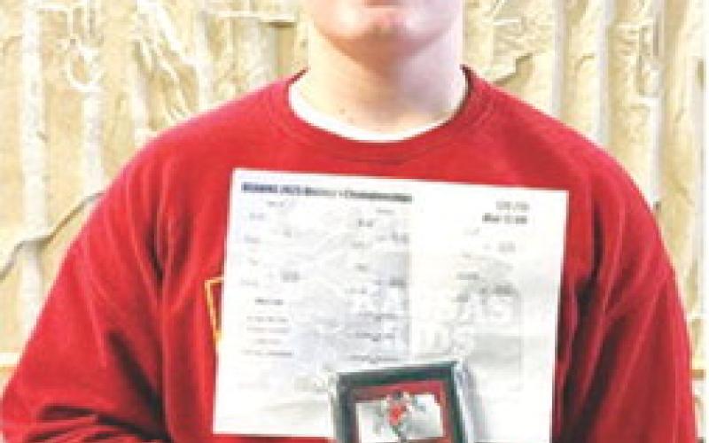 Cajen Smith won the 12U 215 District 1 Championship in the USAWKS Tournament, Saturday in Lansing. He advances to the state tournament this Friday and Saturday in Topeka. Courtesy photo.