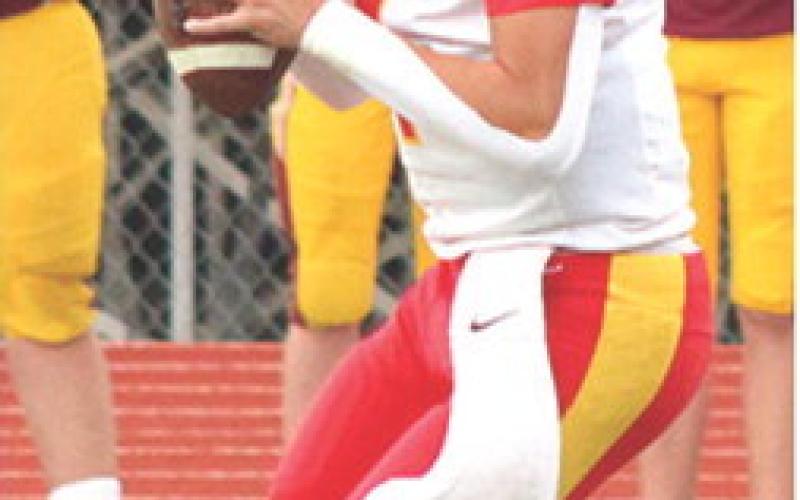 Sophomore Quarterback, Cole Howard, took varsity snaps for the Titans during the four-team Jamboree scrimmage Friday night in Girard. Parsons and Pittsburg also participated.
