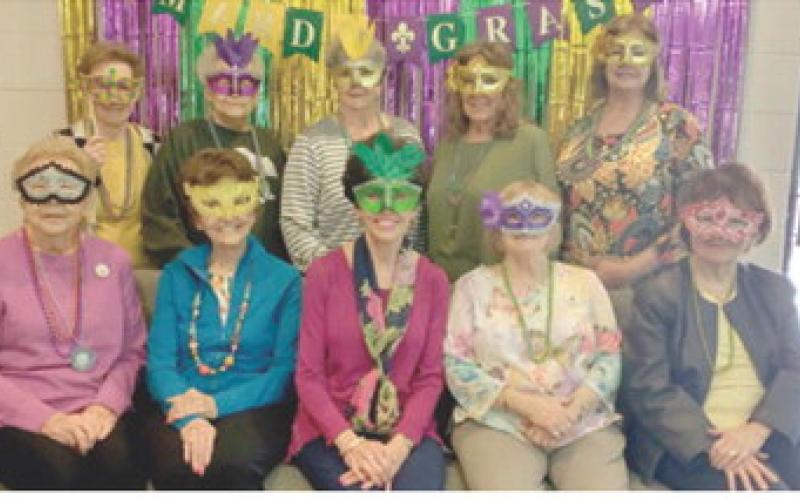 PEO celebrates Mardi Gras at meeting