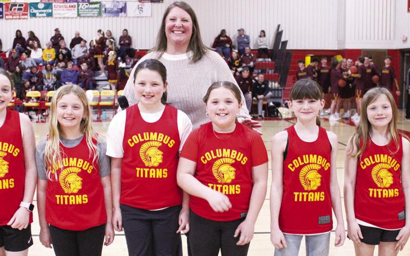Members of the Columbus Recreation Commission’s Lady Titan League were introduced during the CUHS Basketball game with Girard in February. Members of the third grade Lady Titan Team are Willow Patton, Peyton Hayes, Teagan Jarrett, Wren Ellis, Andi Parsons, Hadley Bessman, and Mariah Moser. Teammates not pictured are Carrie Mooreman, Hayven Griffoth, and Shay Neely. The team is coached by Anna Moser, above. Lance Moser and Vanessa Jarrett also coached the team. Morgan Moser served as assistant coach.