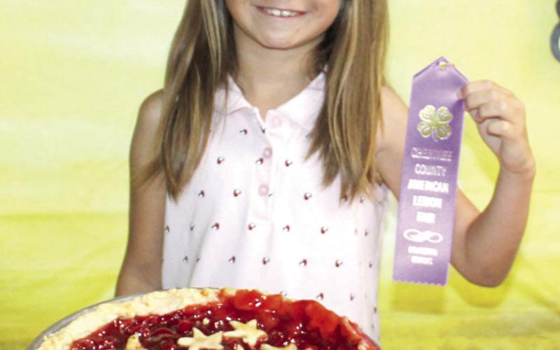 Marlowe Minor recevied a purple ribbon for her patriotic looking pie. The star cutout crust made a fun topper for her dessert.Judging for the 4-H, FFA, Heritage Youth Association foods show was held Monday, July 6 at noon.