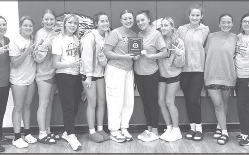Members of the Lady Titan Varsity Volleyball Team bringing home the first volleyball hardwarde for Columbus High School are: Coach Ryan Lacen, Morgan Richards, Trinity Green, Graci Major, Ava Harman, KT Lopp, Katie Simpson, Harley Long, Ruby Stover, Katy Mooney, and assistant coach, Jessica Scott. See page nine in today’s News-Report for complete coverage. Courtesy photo.
