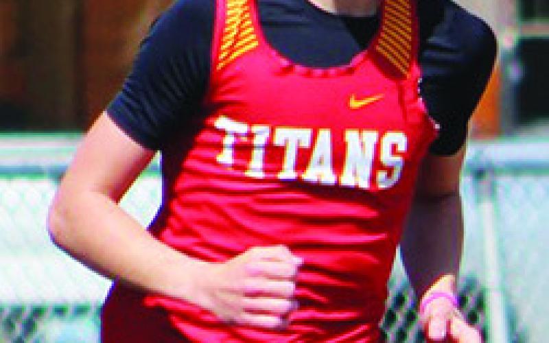 Titans win marathon run rule sweep