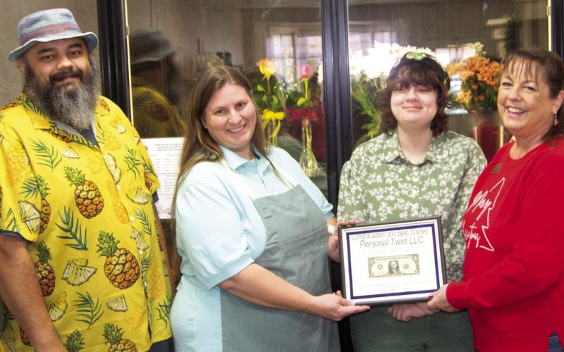 The Clinton Cooper Family, including Clinton, Kristy and Ona, after 13 years operating a flower shop in Idaho have opened a shop in Columbus. “This is what we were looking for, we also have the 3-D printer gift items,” said Clinton