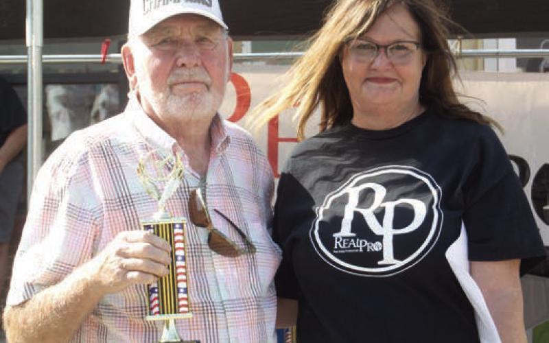 Lee Cossairt received the second place trophy for his 2003 Thunderbird Convertible in the 2000 to present division of the Columbus Day Car Show.