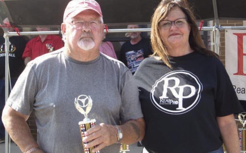 Lonnie Hix was the first place winner in the Best Exterior category. His vehicle was a 1969 Chevrolet C-10. Becky McDaniel presented the award.
