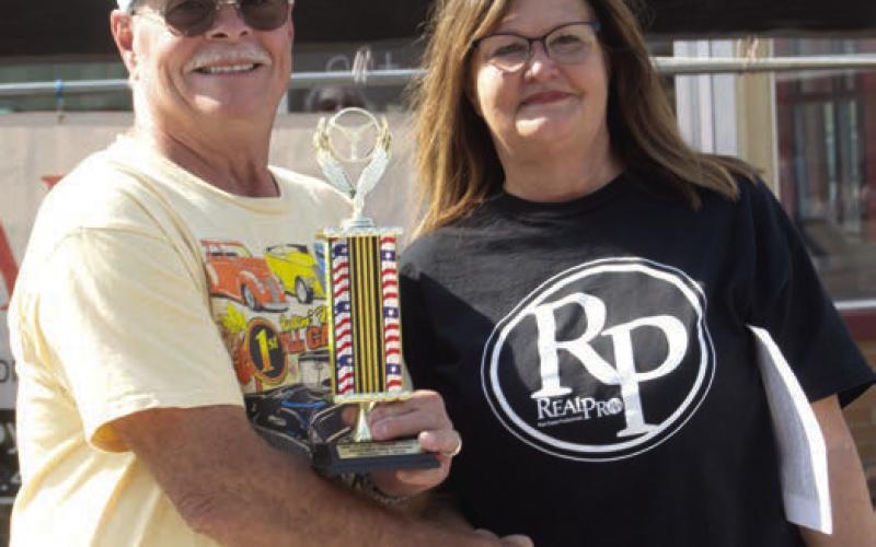 Phillip Shelley received the second place trophy in the 1980-1990 division for his 1999 Plymouth Prowler. Not pictured were Tyler Ross the second place finisher in the 1960 to 1970 trucks division and Lee LaFalier and Kay Cee LaFalier took first place in the 2000 to present car with their 2009 Chevy HHR.