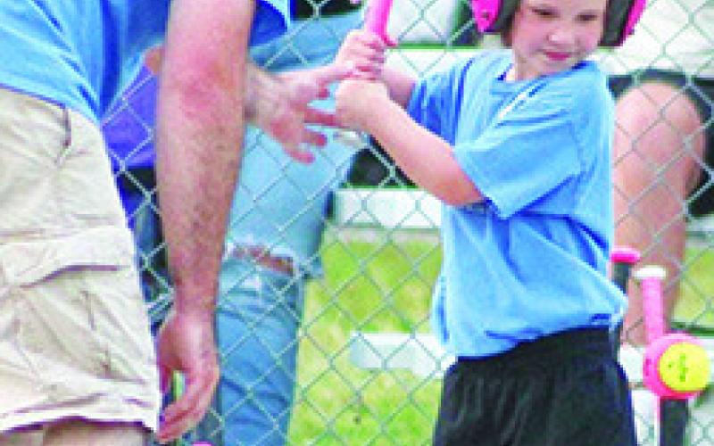 Kyra Lacen and Blakey Hinman are ready in the field and awaiting a hit during the final weeks of the Columbus Girls Softball Tee-Ball action at the Community Field Ballpark. The girls wrap up their season next week with games on Monday and Wednesday beginning at 5:30 p.m.