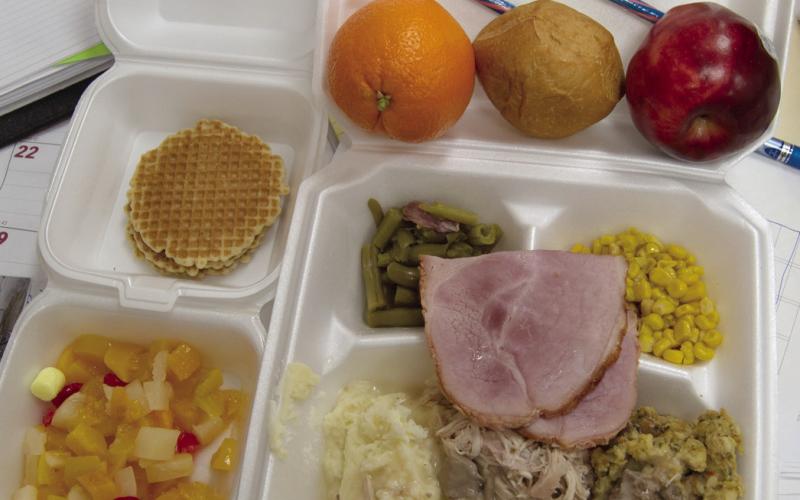 Diners were not disappointed at the drive thru Community Christmas dinner. The meal included ham, turkey, mashed potatoes, gravy, dressing, corn, green beans, roll, fruit salad, fresh fruit and cookies.