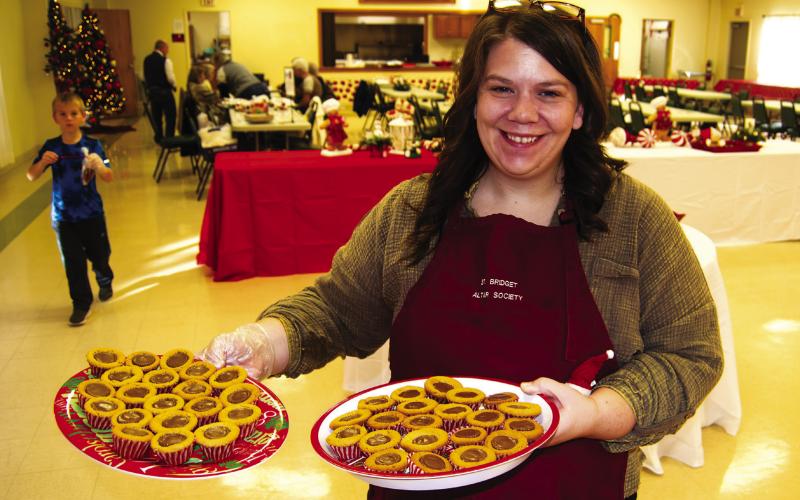 Janet Holden was refilling the tables with cookies but, not nearly as fast as they were selling.