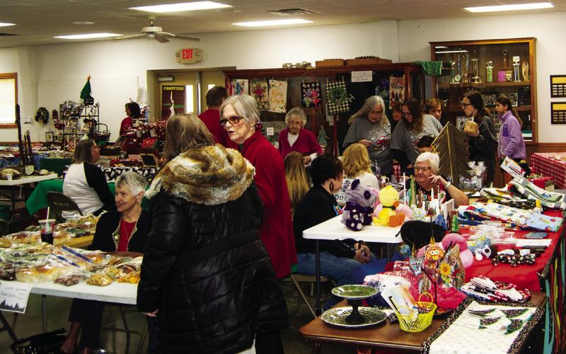 A full house Saturday at the 4-H Building as the Holiday Fair was underway. Shoppers were looking, shopping and buying the merchandise.