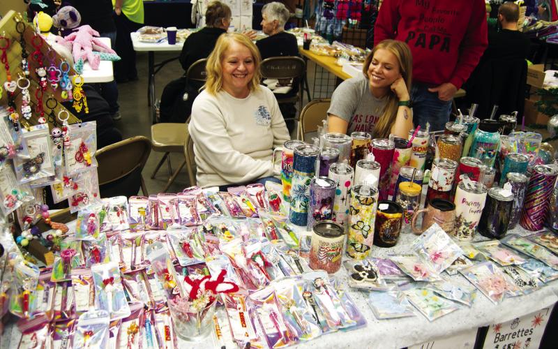Lady Z Creations had a colorful table at the Holiday Fair Saturday in the 4-H Building. Lori Zwahlen and Anna Leet have the colorful merchandise.