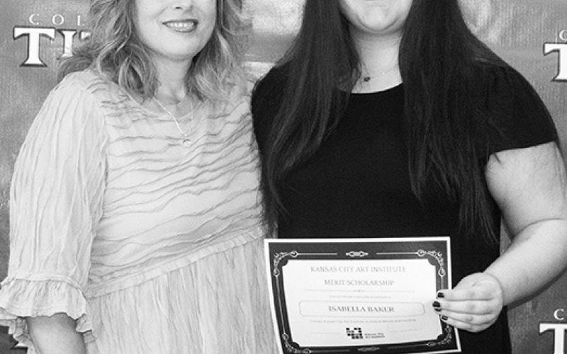 Isabella Baker received a Merit Scholarship to study at the Kansas City Art Institute in the amount of $80,000. Angela Resa presented the award during the Senior Assembly at the Columbus Unified High School Gym, May 19.