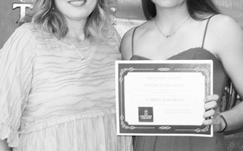 Aubree Saporito was presented an Honors (books, tuition, fees) Scholarship in the amount of $14,400 and a Housing Scholarship to play softball for $9,600 from Crowder College. The award was presented by Angela Resa during the Senior Assembly, May 19 at the Columbus Unified High School Gymnasium.