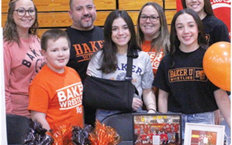 Six Lady Titans sign college letters