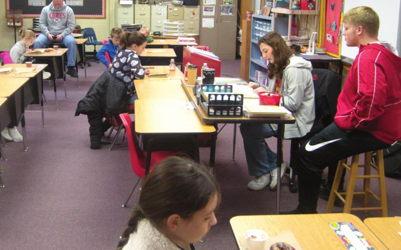 Titans enjoy breakfast with a book