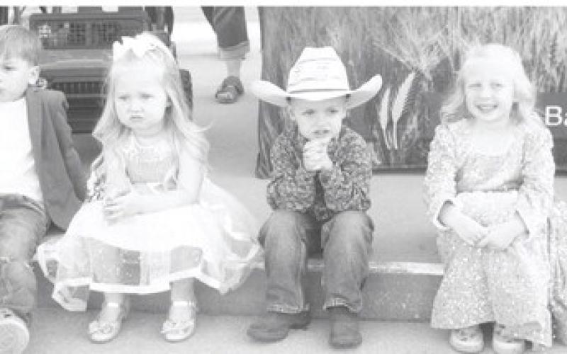 The young contestants in the Little Mr. and Little Miss Columbus contest waited anxiously for the announcement of the winner. A total of over $7,000 was raised by the contestants. The winners were crowned during the bean feed at the Columbus Days Festival.