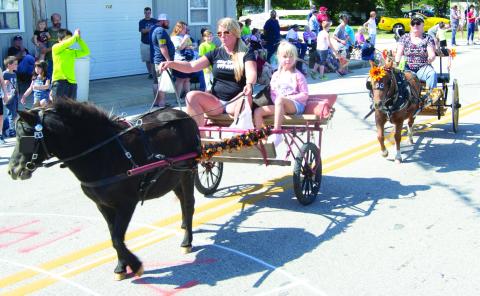 The grand finale at the 83rd Weir Homecoming Parade were the horses. In addition, two-wheeled carts pulled by ponies carried their riders along the parade route.