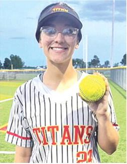 Katy Mooney, Lady Titan Senior, capped the shutout win for Columbus, 7-0, in game one of the double header sweep in Girard, Thursday. The homer over the centerfield fence came in the bottom of the fourth inning, ending all scoring. Courtesy photo.