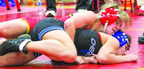 Lady Titan Freshman, Tatum Kirk, won five matches with one forfeit in the Columbus Duals, Friday at the CUHS Gym.