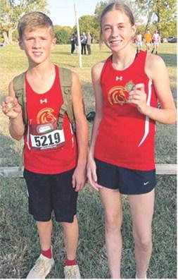 The Columbus Junior High School Cross Country Team wrapped up their 2024 season, October 10, at the Pleasanton Junior High Meet. Eli Engleman placed eighth in the seventh grade boys race and Sammi Ohmart took first place in the seventh grade girls event. Sammi placed first in four of the six meets in her rookie season and was second at the Columbus Invitational. Eli placed in the top ten at five races in his inaugural junior high season and was 14th at Columbus. Courtesy photo.