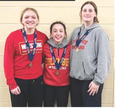 Lady Titans Emily Britt, senior; Hannah Noel, sophomore, and Adalynn Hutto, freshman placed third, fifth, and fourth in the Kansas Class 4A Girls Wrestling Tournament, Saturday, in Salina. Columbus placed ninth out of 54 teams at the tournament. Courtesy photo.
