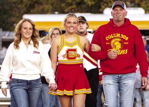 Lady Titan Senior, Kenadie Carter, was recognized on Senior Night, Friday, at Titan Stadium, prior to the 28-21, Columbus win over Parsons. Kenadie is a three-year member of the Titan Cross Country Team, one-year member of the Lady Titan Volleyball Team, and one-year member of the Titan Cheer Squad. She was escorted by her parents, Johna and Travis Carter.