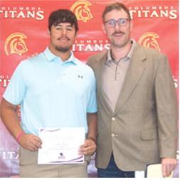 Rece Ponce received a Football Scholarship from Butler Community College in the amount of $12,000 during the Columbus Unified High School Senior Assembly, May 16, at the CUHS Gymnasium. The scholarship was presented by USD 493 Instructor, Matt Crain.