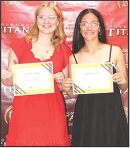 Chloe Rogers and Katy Mooney received the Sandra B. Houser Columbus Community Foundation Scholarship in the amount of $1,000 each at the Senior Assembly, May 16, in the Columbus Unified High School Gymnasium.