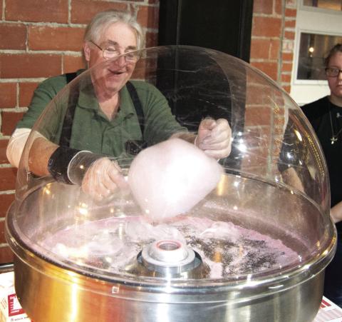 Nothing says circus or carnival like cotton candy, Steve Langerot was busy during the evening giving everyone a taste of the pink fluff.