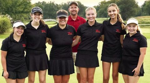 The Lady Titan Golf Team took first place in the St. Mary’s-Colgan Invitational at Crestwood Country Club, Thursday, in Pittsburg. The team won the team title by 13 strokes over their host Lady Panthers. Team members are: Hannah Noel, Natalie Wary, Fallon Smiley, Coach Jerry Smiley, Cali Carpino, Addison Johnson, and Amory Neely. Courtesy photo.
