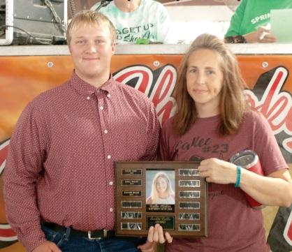 Traveling plaques presented during county fair
