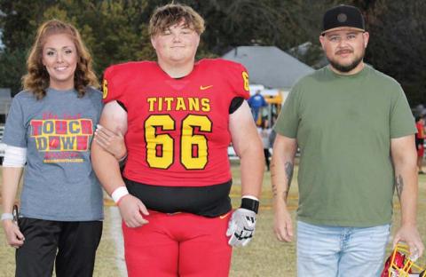Titan Senior, Austin Glover, was recognized on Senior Night, October 25, at Titan Stadium. Austin is a three-year member of the Titan Football Team. He was escorted by his parents Erin and Jared Glover.