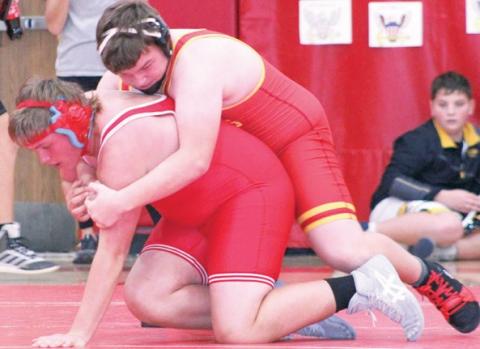 Smith wins three in junior high wrestling scramble