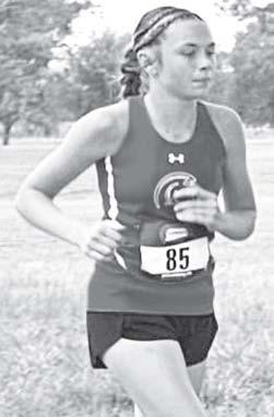 Lady Titan Eighth Grader, Sammi Ohmart, won first place in the Oswego Cross Country Meet, Thursday. The race was the first one held by the Oswego School District. Courtesy photo.
