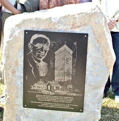 Standing silently at the corner of Kansas Avenue and Walnut Street, just a block off the Columbus Square, is a small monument in honor of RA Long.