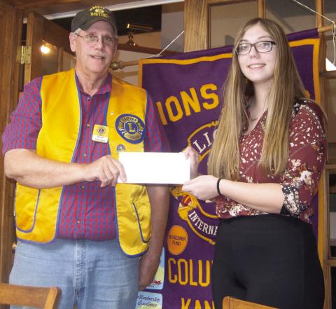 Columbus Lions Club President Brad Gleason recognized Anna Head as Lion of the Month for March at a recent meeting.