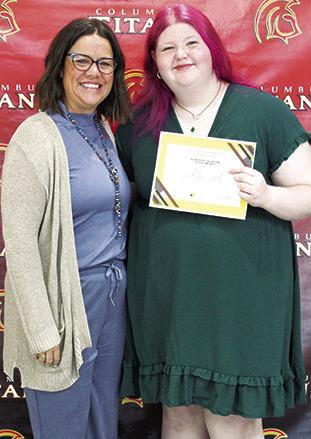 Ashlyn Ash received the Dorothy Jackson Columbus Community Foundation Scholarship in the amount of $2,000 at the Senior Assembly, May 16, in the Columbus Unified High School Gymnasium. The presentation was made by Kelly Walters, USD 493 Title 1 Reading Specialist.