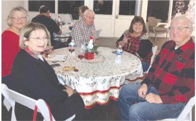 Above and below members of the Cherokee County Democratic Party met at the Old Riverton Post Office for their annual meeting and Christmas party. Tom Pryer spoke to the group about Medicaid Expansion.