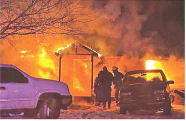 Columbus Firefighters responded to assist with two structure fires late Tuesday night into Wednesday morning. Despite efforts by crews on scene, both structures were a total loss. Photo courtesy of Columbus Fire Department.