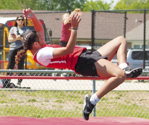 Morgan Anderson, Lady Titan Seventh Grader, took first place in the High Jump event at the Columbus Invitational Track and Field Meet, April 20, at the Central School Complex. Morgan is also a member of the second place 4x400M Relay and the fourth place 800M Medley Relay.