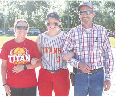 Lady Titan Senior, Trinity Green, was recognized on Senior Night at Rockette Grafel and Juston Grafel. Field, May 11, during the double header split with Riverton. Trinity is a two-year member of the Lady Titan Softball Team. She was escorted by her parents Ryan and Todd Lacen.