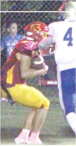 Titan Senior, Jayden Rodriguez, was in the right place at the right time to make the catch off a tipped Jett Tanner (senior) pass for an 18-yard touchdown reception in the fourth quarter of the Columbus Titan’s CNC League loss to Riverton, 12-21, at Titan Stadium, Friday. Junior, Tyler Reitz, defends for the Rams.