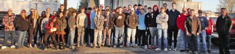 Volunteers distribute Thanksgiving boxes to community