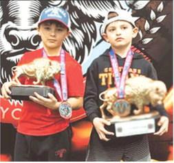 Bearett Bowin placed second, and Jack Jessee, first at the KC Frontier Feud, Saturday, in Kansas City. Jack won the 8U, 55 pound novice division and Bearett was runner up in the 8U, 76 pound open division. Courtesy photo.