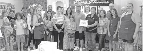 A large turnout of members of the Chamber of Commerce welcomed Nate and Casey Long to the business community on Friday.