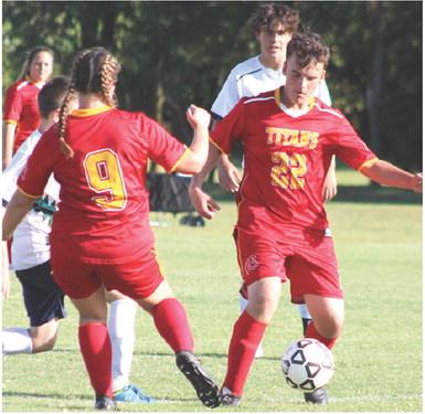The Columbus Unified High School Soccer Team has had two games this season, against Thomas Jefferson Day School from Joplin, Mo. and Liberty Home School. The team is working hard and gives full effort on the pitch and off. Sophomore, Gabe Edwards, controls the ball after receiving a pass from senior, Taryn Billings, on their home pitch recently. The team is tentatively scheduled for a game with Parsons, today at 4 p.m. at the Central School Soccer Pitch.