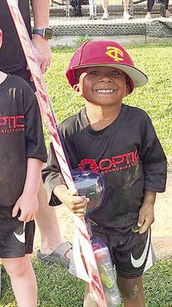 Miles Reeves was the winner of the fishing pole in the Cal Ripken League fundraising drawing held during closing ceremonies, Tuesday. Courtesy Photo.